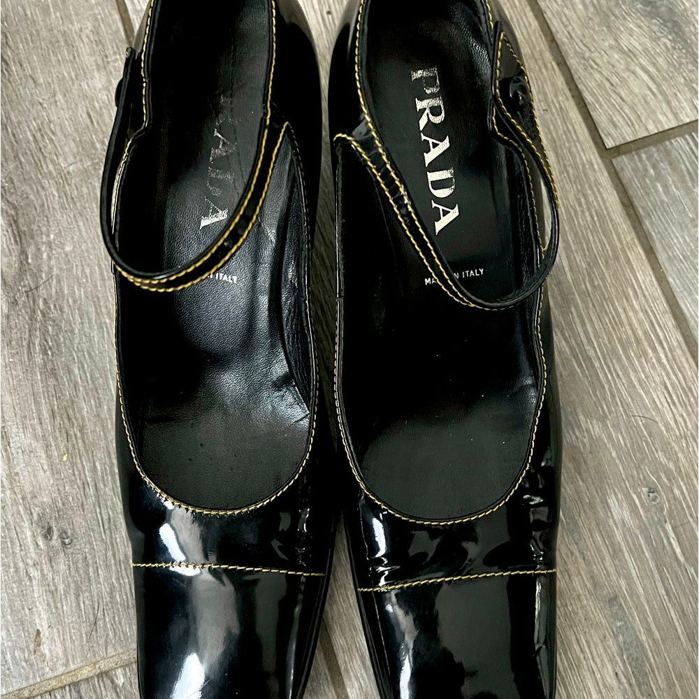 Prada size 39 patent leather 2 1/2” heels with light yellow stitching